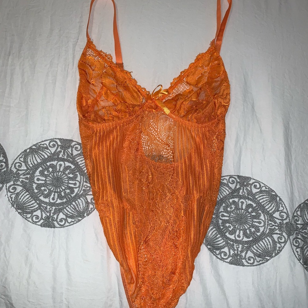 Orange body suit